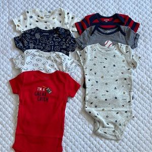 7 short sleeve sports onesies